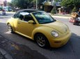 Volkswagen New Beetle    2003 - Xe Volkswagen New Beetle mui trần, đăng ký lần đầu 2003, màu vàng xe nhập