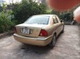 Ford Laser 2002 - Cần bán xe Ford Laser 2002, màu vàng, nhập khẩu, 152tr