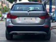 BMW X1 2010 - Bán xe BMW X1 sản xuất 2010 màu xám (ghi), giá 587 triệu, xe nhập