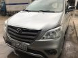 Toyota Innova 2.0E 2014 - Bán Toyota Innova 2.0E màu bạc số sàn, sản xuất 2014, biển Sài Gòn, đi 75000km