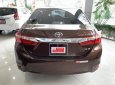 Toyota Corolla altis 1.8AT 2017 - Bán Toyota Corolla altis 1.8AT 2017, màu nâu vàng, chạy lướt