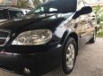 Kia Carnival GS MT 2009 - Bán Kia Carnival GS MT sản xuất 2009, màu đen, nhập khẩu, giá 259tr