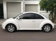 Volkswagen New Beetle 1.6 AT 2009 - Cần bán lại xe Volkswagen New Beetle 1.6 AT đời 2009, màu trắng, nhập khẩu nguyên chiếc