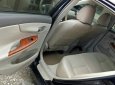 Toyota Corolla altis 2009 - Cần bán lại xe Toyota Corolla Altis đời 2009, màu đen số sàn