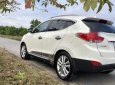 Hyundai Tucson   4WD  2013 - Cần bán lại xe Hyundai Tucson 4WD năm 2013, màu trắng, nhập khẩu