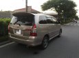 Toyota Innova 2.0E 2015 - Chính chủ gia đình cần bán gấp chiếc Toyota Innova 2.0E sản xuất 2015, số sàn, màu vàng cát