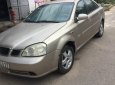 Daewoo Lacetti 1.6 2005 - Cần bán lại xe Daewoo Lacetti 1.6 đời 2005, màu vàng