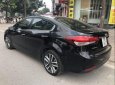 Kia Cerato 1.6 AT 2017 - Cần bán lại xe Kia Cerato 1.6 AT đời 2017, màu đen, giá tốt