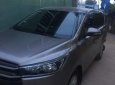 Toyota Innova MT 2017 - Cần bán xe Innova đời 2017, số sàn, màu đồng ánh kim