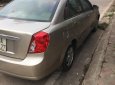 Daewoo Lacetti 1.6 2005 - Cần bán lại xe Daewoo Lacetti 1.6 đời 2005, màu vàng