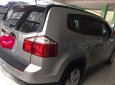 Chevrolet Orlando 2013 - Cần bán gấp Chevrolet Orlando sản xuất năm 2013, màu bạc như mới