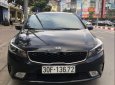 Kia Cerato 1.6 AT 2017 - Cần bán lại xe Kia Cerato 1.6 AT đời 2017, màu đen, giá tốt