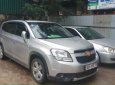 Chevrolet Orlando 1.8AT 2014 - Cần bán gấp Chevrolet Orlando 1.8AT năm 2014, màu bạc còn mới