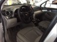 Chevrolet Orlando 2013 - Cần bán gấp Chevrolet Orlando sản xuất năm 2013, màu bạc như mới