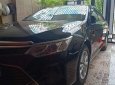 Toyota Camry 2016 - Bán xe Toyota Camry 2016, màu đen đã đi 31000km, giá chỉ 900 triệu