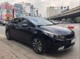 Kia Cerato 1.6 AT 2017 - Cần bán lại xe Kia Cerato 1.6 AT đời 2017, màu đen, giá tốt