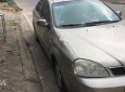 Daewoo Lacetti 1.6 2005 - Cần bán lại xe Daewoo Lacetti 1.6 đời 2005, màu vàng