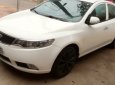 Kia Forte   1.6 MT  2010 - Bán ô tô Kia Forte 1.6 MT sản xuất năm 2010, màu trắng, giá 320tr