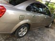 Daewoo Lacetti 2010 - Bán xe Daewoo Lacetti sản xuất 2010, màu vàng, xe gia đình