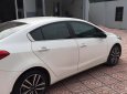 Kia K3 2.0 2015 - Cần bán xe Kia K3 2.0 tháng 12/2015, màu trắng, ODO 26000, giá bán 590tr