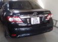 Toyota Corolla altis   2010 - Bán Toyota Corolla altis năm sản xuất 2010, màu đen, số sàn