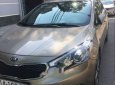 Kia K3 2014 - Bán xe Kia K3 năm sản xuất 2014, màu vàng cát