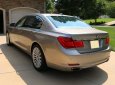 BMW 7 Series 750Li 2011 - Cần bán xe BMW 750Li 2011 màu vàng kim