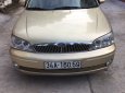 Ford Laser 2002 - Can bán xe Fors Laser Duluxe 2002 màu vàng cát chính chủ