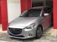 Mazda 2 2016 - Bán xe Mazda 2 năm sản xuất 2016, màu xám, xe gia đình