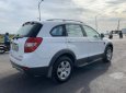 Chevrolet Captiva 2009 - Cần bán gấp Chevrolet Captiva sản xuất 2009, màu trắng xe gia đình, 318tr