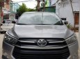 Toyota Innova E 2017 - Bán gấp xe Toyota Innova E số sàn 2017, đăng kí 2018 màu xám bạc