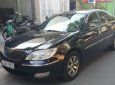 Toyota Camry 2002 - Bán xe Toyota Camry đời 2002, màu đen, 300tr