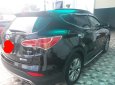 Hyundai Santa Fe 2.4AT 4WD 2015 - Bán ô tô Hyundai Santa Fe 2.4AT 4WD 7 chỗ sản xuất 2015, màu đen