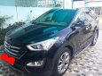 Hyundai Santa Fe 2.4AT 4WD 2015 - Bán ô tô Hyundai Santa Fe 2.4AT 4WD 7 chỗ sản xuất 2015, màu đen