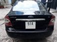 Ford Focus  2.0 AT 2005 - Cần bán Ford Focus 2.0 AT 2005, màu đen, xe nhập số tự động