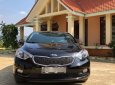 Kia K3 1.6 MT 2015 - Cần bán lại xe Kia K3 1.6 MT năm sản xuất 2015, màu đen số sàn, giá tốt