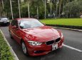 BMW 3 Series   320i  2012 - Cần bán xe BMW 3 Series 320i 2012, màu đỏ như mới, giá 810tr