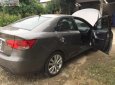 Kia Cerato 2010 - Cần bán Kia Cerato đời 2010, màu xám, xe gia đình mua mới từ đầu