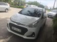 Hyundai Grand i10  AT 2018 - Bán Hyundai Grand i10 AT đời 2018, màu trắng chính chủ, 435 triệu