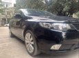 Kia Cerato   2011 - Cần bán lại xe Kia Cerato 2011, màu đen, nhập khẩu