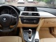 BMW 3 Series   320i  2012 - Cần bán xe BMW 3 Series 320i 2012, màu đỏ như mới, giá 810tr