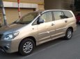 Toyota Innova 2.0E 2014 - Cần bán chiếc xe Toyota Innova E cuối 2014 màu vàng cát