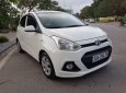 Hyundai Grand i10 MT 2015 - Cần bán lại xe Hyundai Grand i10 MT 2015, màu trắng, nhập khẩu như mới