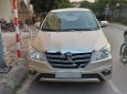 Toyota Innova 2.0E 2014 - Cần bán chiếc xe Toyota Innova E cuối 2014 màu vàng cát