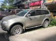 Mitsubishi Pajero Sport 2014 - Bán Mitsubishi Pajero Sport năm 2014, màu vàng