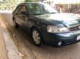 Ford Laser 1.8AT Ghia 2005 - Cần bán xe Ford Laser 1.8 Ghia số tự động, máy móc sạch sẽ, sơn rin còn khá nhiều