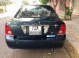 Ford Laser 1.8AT Ghia 2005 - Cần bán xe Ford Laser 1.8 Ghia số tự động, máy móc sạch sẽ, sơn rin còn khá nhiều