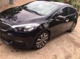 Kia K3   2014 - Bán xe Kia K3 sản xuất năm 2014, màu đen còn mới