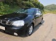 Daewoo Lacetti EX 1.6 MT 2004 - Cần bán gấp Daewoo Lacetti EX 1.6 MT năm sản xuất 2004, màu đen 