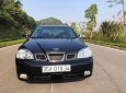 Daewoo Lacetti EX 1.6 MT 2004 - Cần bán gấp Daewoo Lacetti EX 1.6 MT năm sản xuất 2004, màu đen 